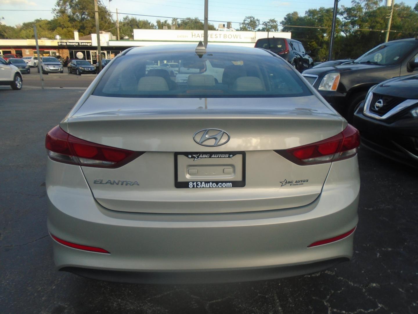 2017 Hyundai Elantra Limited (KMHD84LF1HU) with an 1.8L L4 DOHC 16V engine, 6A transmission, located at 6112 N Florida Avenue, Tampa, FL, 33604, (888) 521-5131, 27.954929, -82.459534 - Photo#4